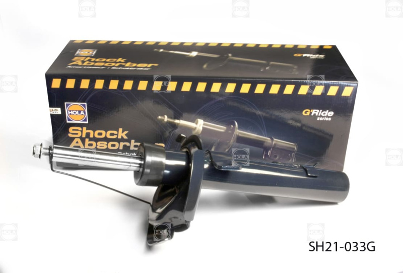 HOLA SH21-033G Стойка амортизаторная перед левая